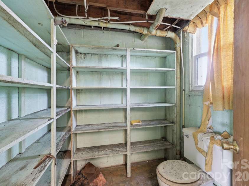 607 Ebenezer Road, Kannapolis, NC 28083.  MLS# CAR4397571, YatesRealty ID 32847. Basement half bath