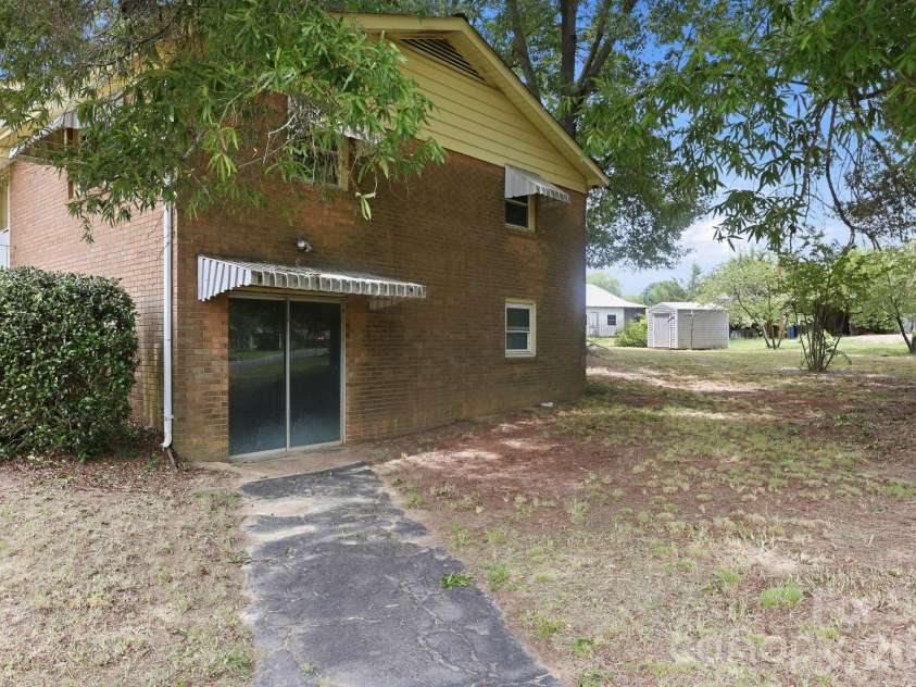 607 Ebenezer Road, Kannapolis, NC 28083.  MLS# CAR4397571, YatesRealty ID 32847. Exterior walk out for basement