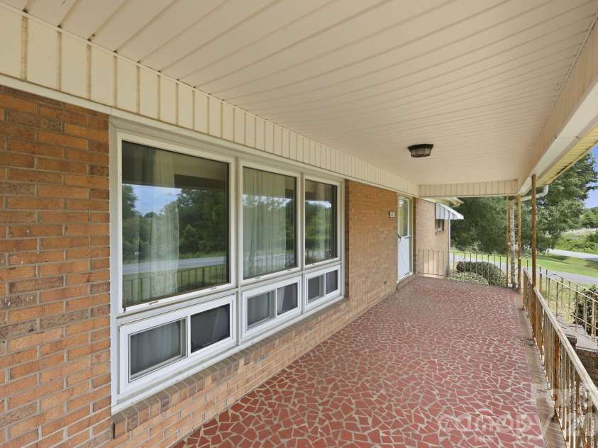 607 Ebenezer Road, Kannapolis, NC 28083.  MLS# CAR4397571, YatesRealty ID 32847. Huge front porch!
