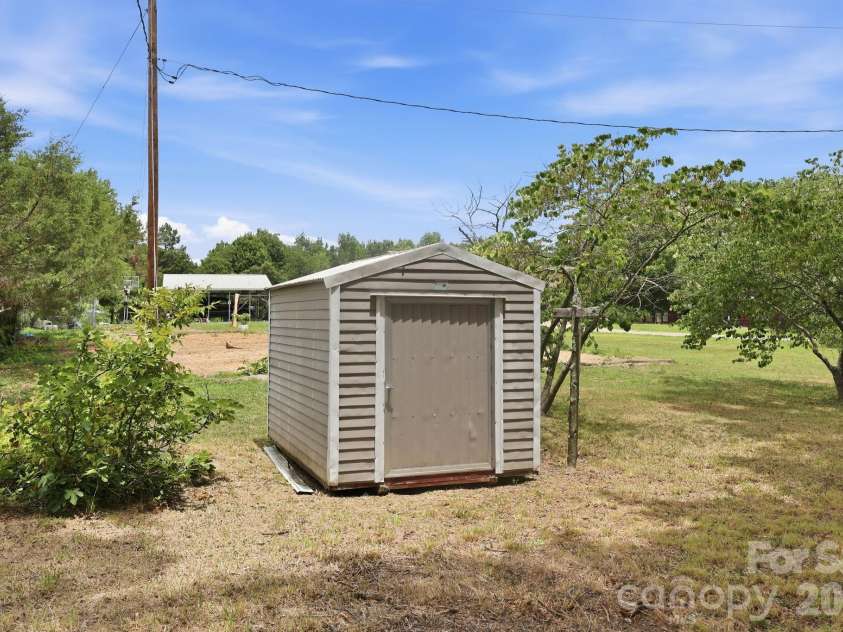 607 Ebenezer Road, Kannapolis, NC 28083.  MLS# CAR4397571, YatesRealty ID 32847. Shed conveys