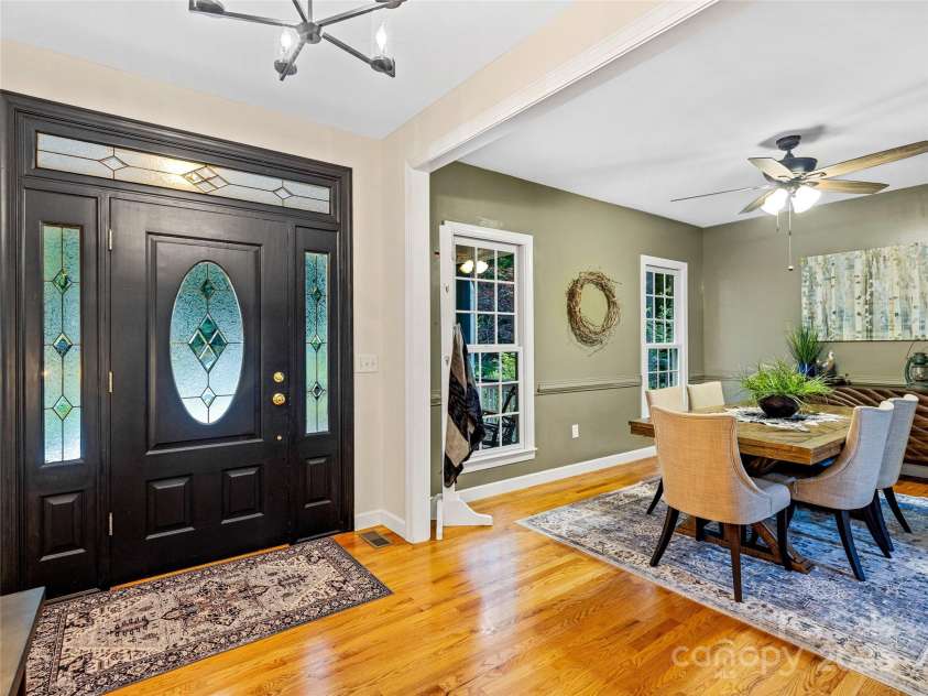 247 Big Raven Lane, Saluda, NC 28773.  MLS# CAR4272997, YatesRealty ID 32851. Front entry and dining room