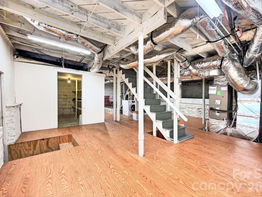 28 Chatham Road, Asheville, NC 28804.  MLS# CAR4394555, YatesRealty ID 32854. Plenty of amazing flex space in the basement