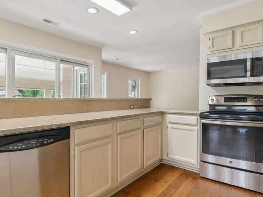 2234 Hamilton Mill Road, Charlotte, NC 28270.  MLS# CAR4261360, YatesRealty ID 32855. AI generated painted white kitchen