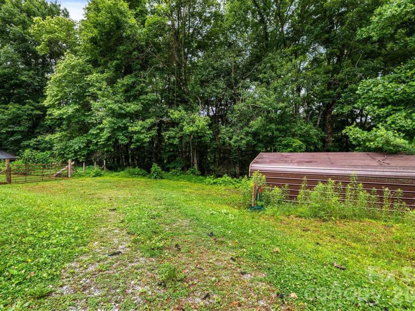 633 Wilson Lane, Boone, NC 28607.  MLS# CAR4397666, YatesRealty ID 32858. Carport