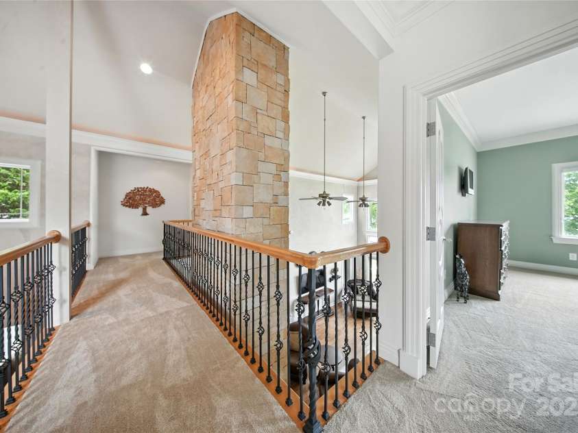 111 Keel Court, Mooresville, NC 28117.  MLS# CAR4287442, YatesRealty ID 32866. Upstairs walkway