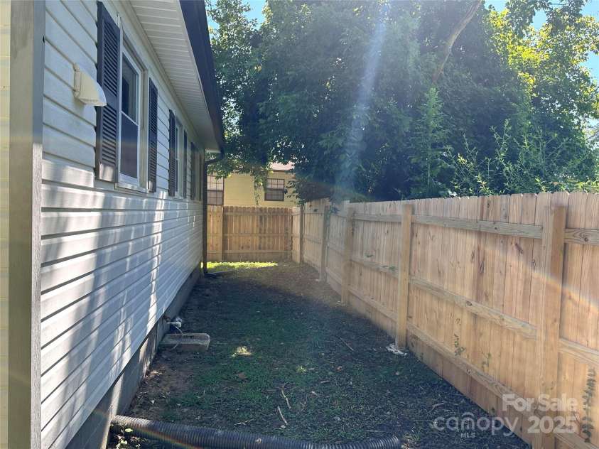 746 Geneva Street, Hendersonville, NC 28739.  MLS# CAR4285221, YatesRealty ID 32870. Back yard