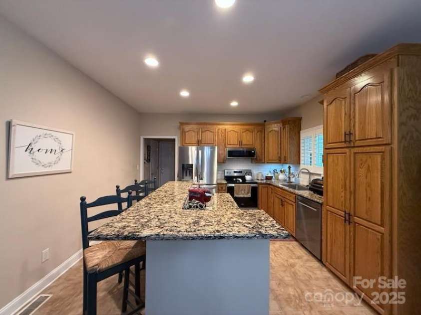 2261 Stallings Road, Harrisburg, NC 28075.  MLS# CAR4281863, YatesRealty ID 32872. 