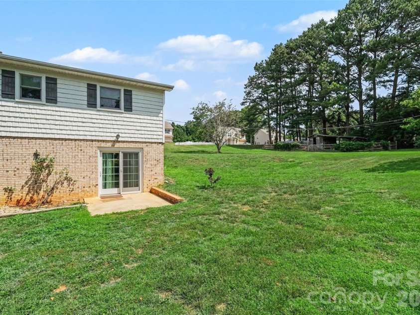 7107 Rolling Hills Drive, Sherrills Ford, NC 28673.  MLS# CAR4396922, YatesRealty ID 32874. Back Exterior with walkout access