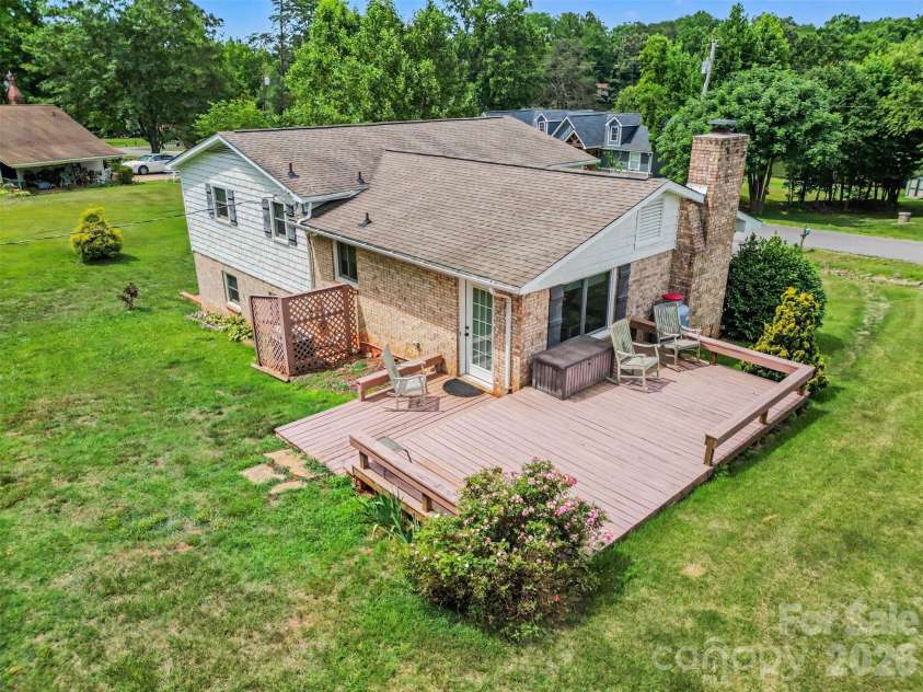 7107 Rolling Hills Drive, Sherrills Ford, NC 28673.  MLS# CAR4396922, YatesRealty ID 32874. Backyard and deck