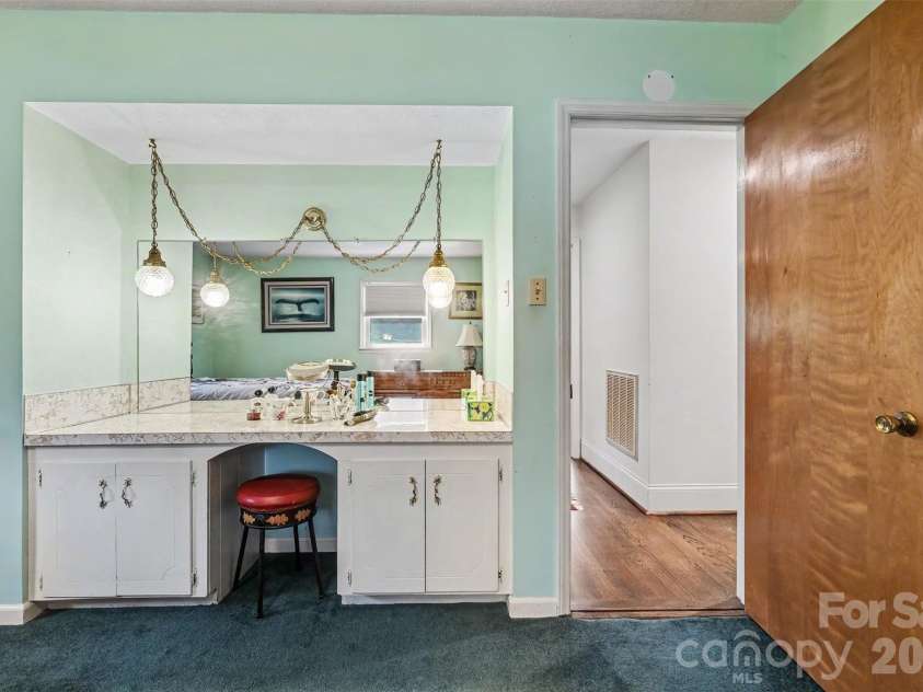 7107 Rolling Hills Drive, Sherrills Ford, NC 28673.  MLS# CAR4396922, YatesRealty ID 32874. Built-in vanity