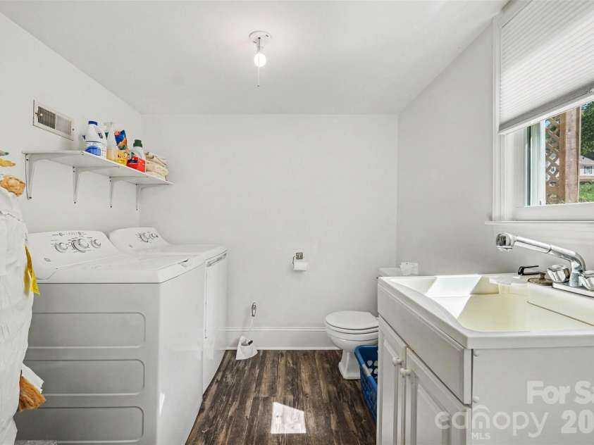 7107 Rolling Hills Drive, Sherrills Ford, NC 28673.  MLS# CAR4396922, YatesRealty ID 32874. Lower level bathroom and laundry room