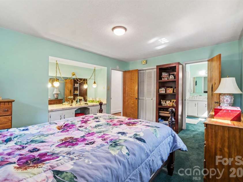 7107 Rolling Hills Drive, Sherrills Ford, NC 28673.  MLS# CAR4396922, YatesRealty ID 32874. Primary Bedroom with built-in vanity