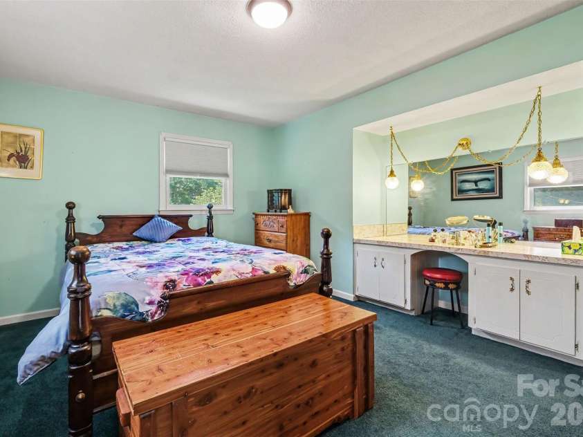 7107 Rolling Hills Drive, Sherrills Ford, NC 28673.  MLS# CAR4396922, YatesRealty ID 32874. Primary Bedroom with built-in vanity