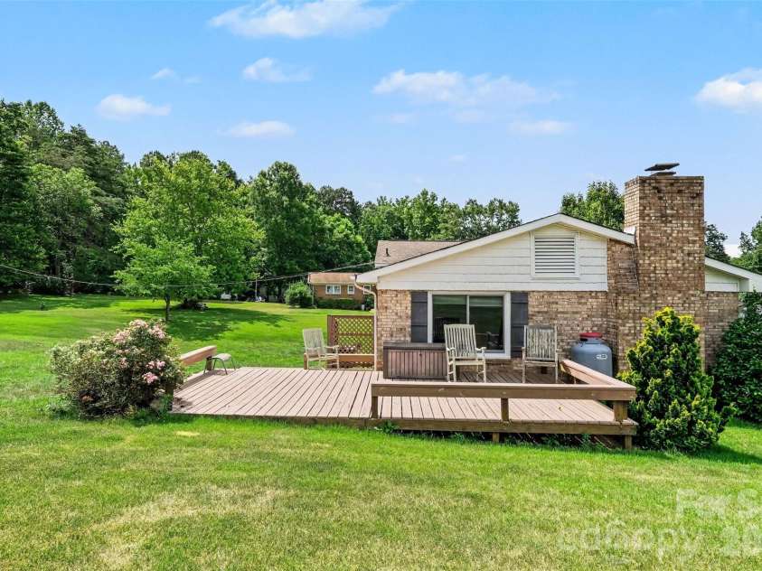 7107 Rolling Hills Drive, Sherrills Ford, NC 28673.  MLS# CAR4396922, YatesRealty ID 32874. Spacious backyard and deck