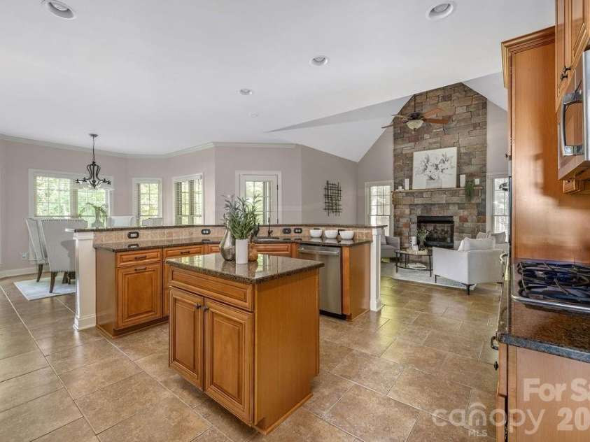 8325 Curico Lane, Charlotte, NC 28227.  MLS# CAR4387517, YatesRealty ID 32877. Kitchen includes Keeping Room