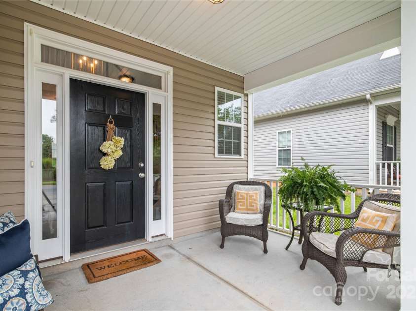 19333 Pocono Lane, Cornelius, NC 28031.  MLS# CAR4286537, YatesRealty ID 32878. Huge covered front porch.