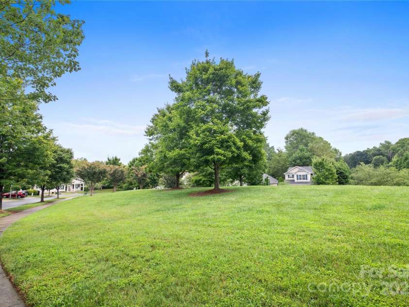 19333 Pocono Lane, Cornelius, NC 28031.  MLS# CAR4286537, YatesRealty ID 32878. Neighborhood park directly across from the house! You don't have any house out the front or the back of the house. There is also a lot of on-street parking for guests.