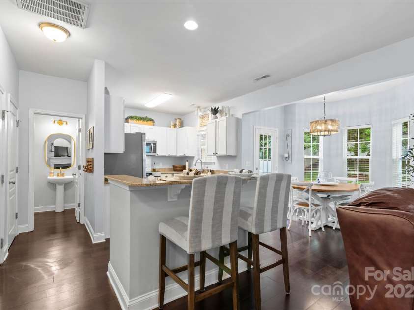 19333 Pocono Lane, Cornelius, NC 28031.  MLS# CAR4286537, YatesRealty ID 32878. Powder Room down the hall from the kitchen.