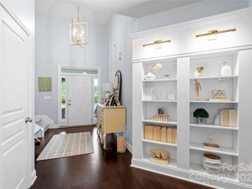 19333 Pocono Lane, Cornelius, NC 28031.  MLS# CAR4286537, YatesRealty ID 32878. View from the family room. Custom built-in with designer lighting.