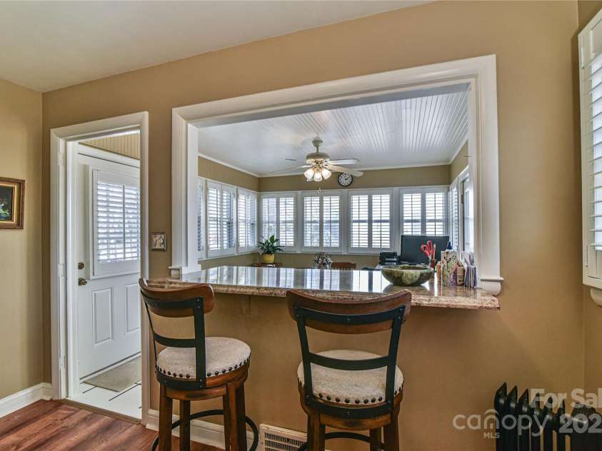 302 Montreat Road, Black Mountain, NC 28711.  MLS# CAR4234971, YatesRealty ID 3288. Eat-At Bar. Stools Convey