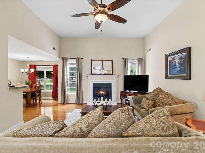 2024 Galena Chase Drive, Indian Trail, NC 28079.  MLS# CAR4393718, YatesRealty ID 32881. Living room with fireplace
