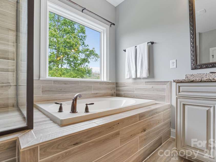 166 Stibbs Cross Road, Mooresville, NC 28115.  MLS# CAR4380055, YatesRealty ID 32883. Primary Bath