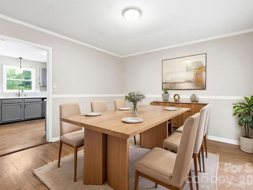16 Trappers Run Drive, Asheville, NC 28805.  MLS# CAR4385728, YatesRealty ID 32885. Dinning room virtually staged