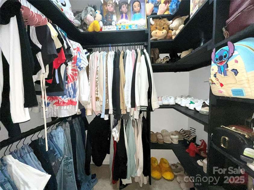 4205 Springhaven Drive, Charlotte, NC 28269.  MLS# CAR4275693, YatesRealty ID 32889. 3rd bedroom walk-in closet w/ custom built shelving.