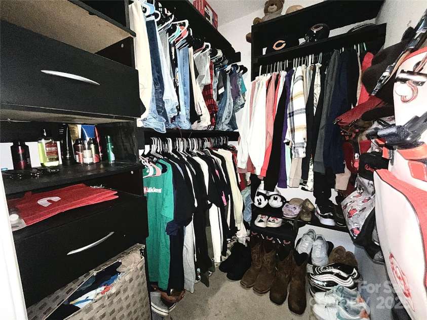 4205 Springhaven Drive, Charlotte, NC 28269.  MLS# CAR4275693, YatesRealty ID 32889. 4th Bedroom has walk-in closet w/ custom built shelving.