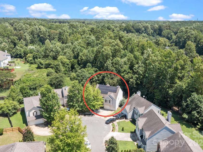 4205 Springhaven Drive, Charlotte, NC 28269.  MLS# CAR4275693, YatesRealty ID 32889. Home backs up to common area full of trees.