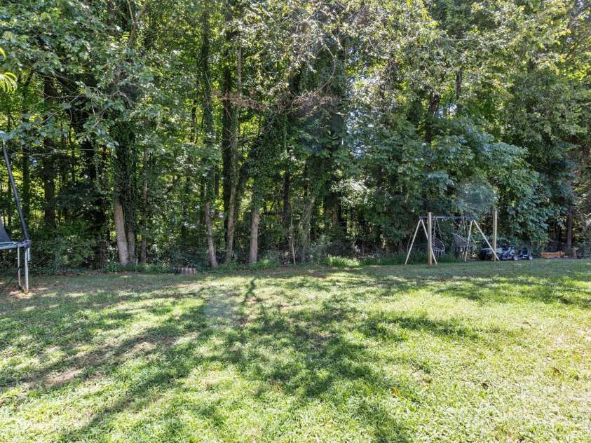 4205 Springhaven Drive, Charlotte, NC 28269.  MLS# CAR4275693, YatesRealty ID 32889. HUGE, private backyard makes a great place for entertaining family and friends.