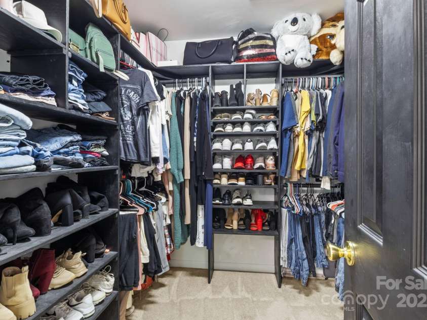 4205 Springhaven Drive, Charlotte, NC 28269.  MLS# CAR4275693, YatesRealty ID 32889. Primary Walk-in closest w/ custom built shelving.