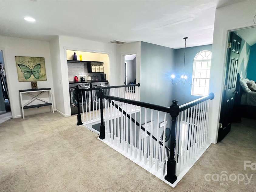 4205 Springhaven Drive, Charlotte, NC 28269.  MLS# CAR4275693, YatesRealty ID 32889. Spacious landing leads you to all the bedrooms upstairs.