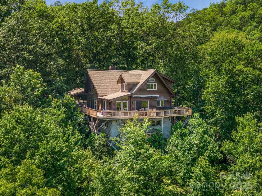 220 Circle Pines Drive, Rosman, NC 28772.  MLS# CAR4279416, YatesRealty ID 3289. 