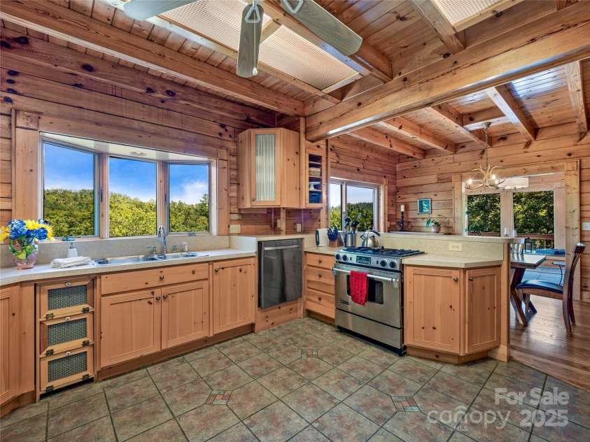 220 Circle Pines Drive, Rosman, NC 28772.  MLS# CAR4279416, YatesRealty ID 3289. 