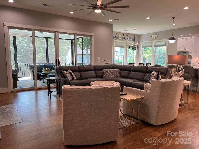 126 Redbud Lane, Troutman, NC 28166.  MLS# CAR4284135, YatesRealty ID 32890. Another view of the great room.