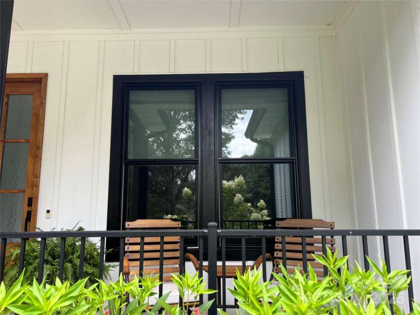 126 Redbud Lane, Troutman, NC 28166.  MLS# CAR4284135, YatesRealty ID 32890. Covered front porch