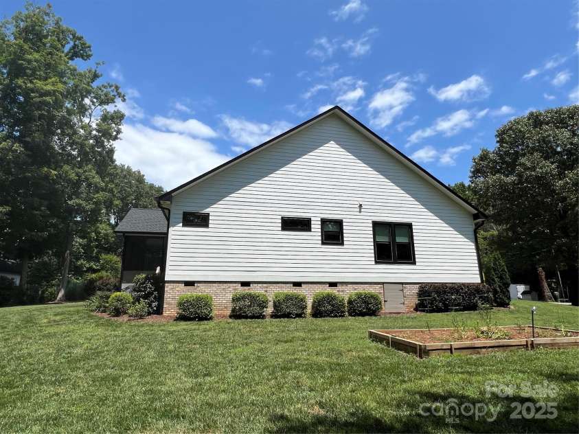 126 Redbud Lane, Troutman, NC 28166.  MLS# CAR4284135, YatesRealty ID 32890. Left elevation