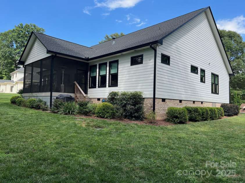 126 Redbud Lane, Troutman, NC 28166.  MLS# CAR4284135, YatesRealty ID 32890. Rear view of that screened porch.
