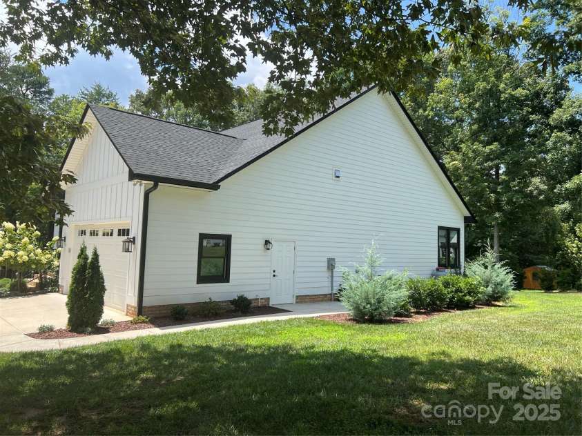 126 Redbud Lane, Troutman, NC 28166.  MLS# CAR4284135, YatesRealty ID 32890. Right elevation