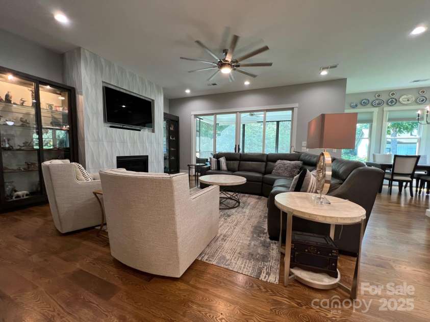 126 Redbud Lane, Troutman, NC 28166.  MLS# CAR4284135, YatesRealty ID 32890. The great room has plenty of room for seating.