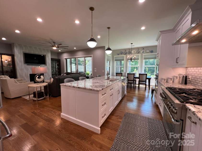 126 Redbud Lane, Troutman, NC 28166.  MLS# CAR4284135, YatesRealty ID 32890. The heart of this home is the gourmet kitchen with this generous island with seating for at least 4.