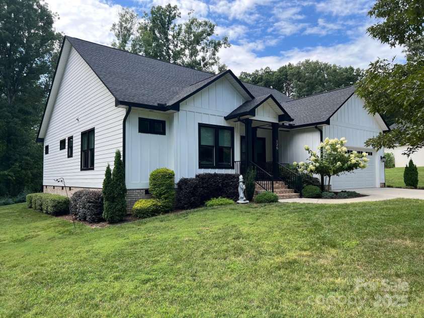 126 Redbud Lane, Troutman, NC 28166.  MLS# CAR4284135, YatesRealty ID 32890. This home sits on a 1/2 acre lot on a quiet street and has no HOA.