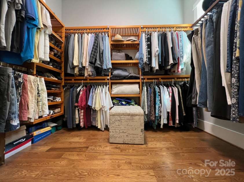 126 Redbud Lane, Troutman, NC 28166.  MLS# CAR4284135, YatesRealty ID 32890. This is just a glimpse into the owners' walk-in closet.