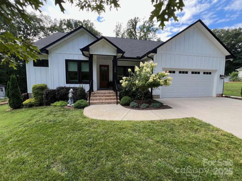 126 Redbud Lane, Troutman, NC 28166.  MLS# CAR4284135, YatesRealty ID 32890. Welcome to 126 Redbud Ln in Troutman!