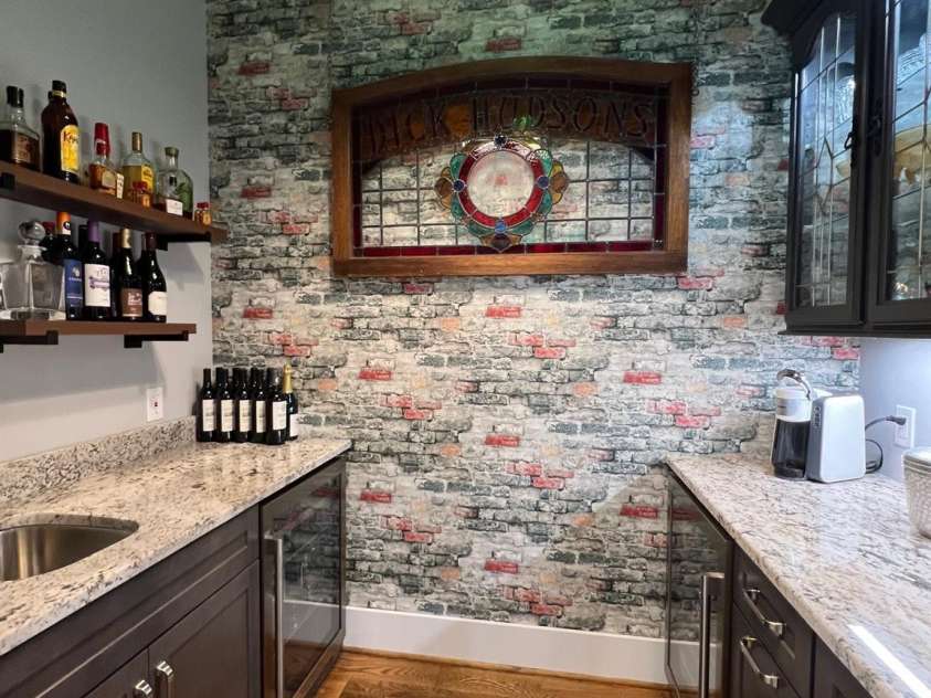 126 Redbud Lane, Troutman, NC 28166.  MLS# CAR4284135, YatesRealty ID 32890. Welcome to the beverage center, coffee bar, or wine bar. This charming room is flanked by 2 granite counters, a bar sink, and lovely glass cabinets to house all of your glasses and stemware.