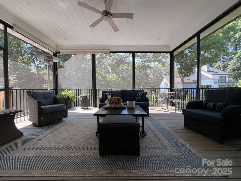 126 Redbud Lane, Troutman, NC 28166.  MLS# CAR4284135, YatesRealty ID 32890. ....where you can relax on this very spacious screened porch. This pleasant area is 19 ft x 16 ft so it will accommodate lots of seating for your friends and family.
