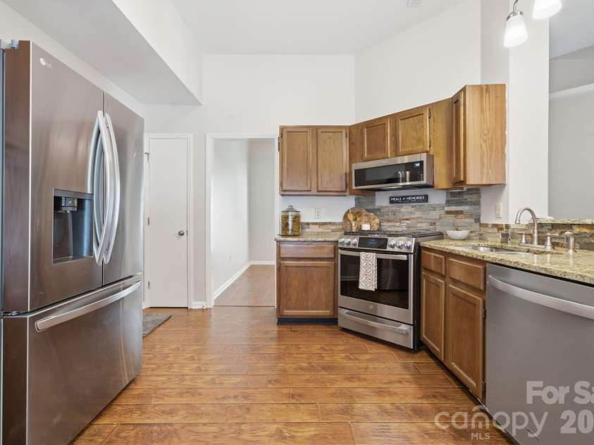 5701 Ebley Lane, Charlotte, NC 28227.  MLS# CAR4390398, YatesRealty ID 32891. Fridge remains with the property!