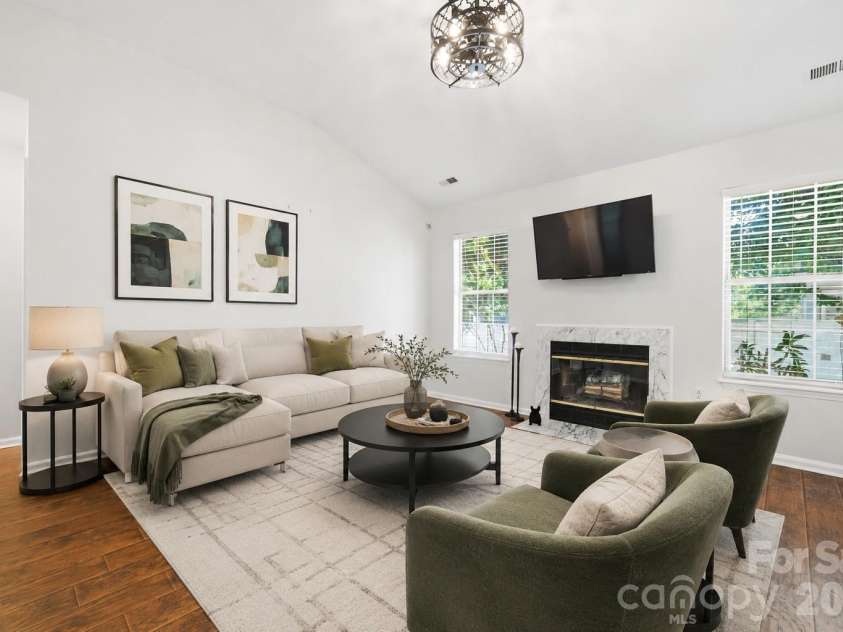 5701 Ebley Lane, Charlotte, NC 28227.  MLS# CAR4390398, YatesRealty ID 32891. Virtually enhanced living room.