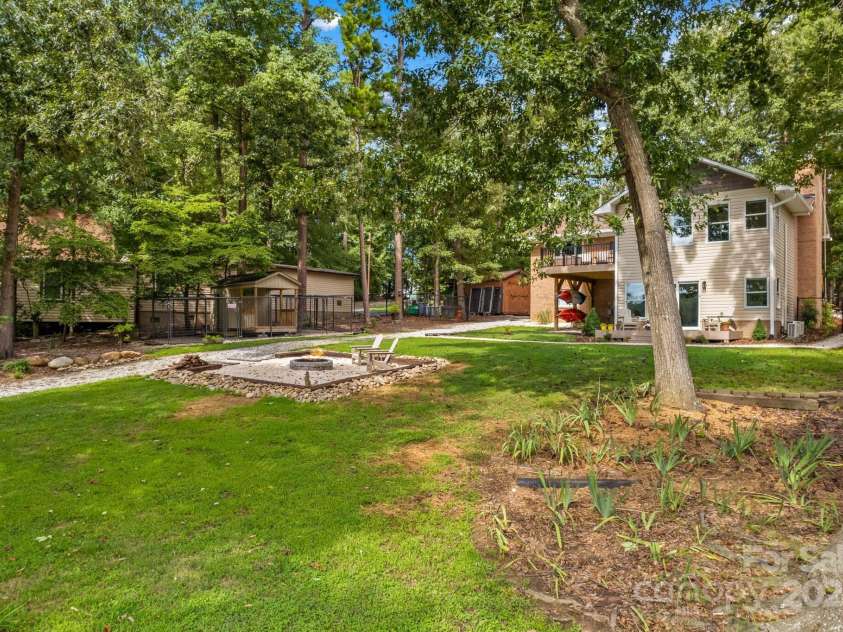 260 Knollwood Drive, Salisbury, NC 28146.  MLS# CAR4289312, YatesRealty ID 32896. View from lake front